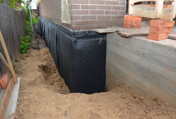 Happy homeowners after waterproofing job in South Saint Paul